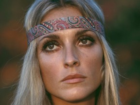 American actress Sharon Tate (1943 - 1969) wearing a pink top and headband, circa 1968.