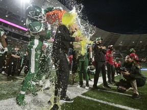 The Saskatchewan Roughriders' Craig Dickenson, who was doused with Garorade on July 1 following his first CFL head-coaching victory, has guided the team through a 1-3 start and is now enjoying a four-game winning streak.