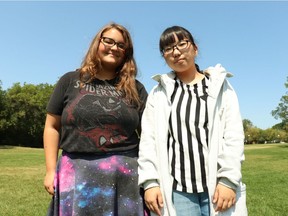 Zanna Martin (left) and Hinako Miyashita take part in Regina-Fujioka Exchange Program activities in Wascana Park Sunday. Martin and Miyashita are partners in the program and this is Miyashita's first time in Canada. Photo by Ethan Williams