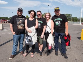 From left, Travis Stewart, Bev Stewart, Fred Fisher, Emily Jones and Tyler Stewart stand for a photo prior to the first of two Garth Brooks shows at Mosaic Stadium.