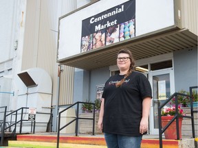 Chrysta Garner, manager of the Centennial Market stands outside the market's west entrance.