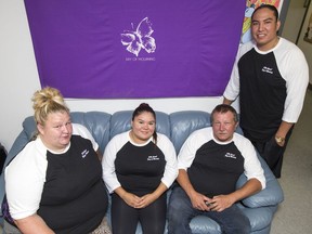Destiny Torrence, left to right, Shelby LaRose, Don Meikle, and Mike Scott, who are all invovled with holding a memorial to victims of sex trafficking orgainzed with EGADZ, sit for a photograph in Saskatoon, SK on Tuesday, August 13, 2019. Meikle is the Executive Director of EGADZ.