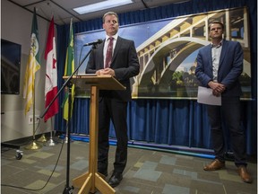 Saskatoon City Manager Jeff Jorgenson, left, and Mayor Charlie Clark during a media conference announcing that the City of Saskatoon had been affected by a fraud scheme, on Thursday, August 15, 2019.