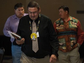 Fond du Lac Chief Louie Mercredi walks into a media conference at the Turvey Centre to speak about funding for improvements to his First Nation's airport.