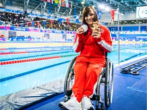 Krystal Shaw with her silver medal from the women's 100 metre backstroke at the Parapan American Games in Lima, Peru. (Photo courtesy of Pascal Villeneuve)
