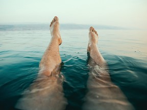 Little Manitou Lake has about half the salt content as that of the Dead Sea, but bathers can still experience extreme buoyancy in its waters.