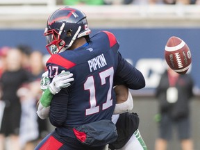 Montreal Alouettes quarterback Antonio Pipkin fumbles while being sacked by the Saskatchewan Roughriders' Derrick Moncrief during Friday's CFL game at Percival Molson Stadium. Saskatchewan's Earl Okine retrieved the loose ball and scored on a 55-yard fumble return.