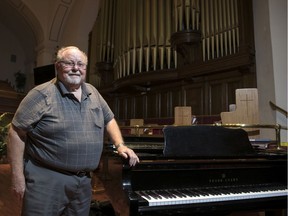Tom Magnuson with the grand piano at Westminster United Church on 13th Avenue in Regina.