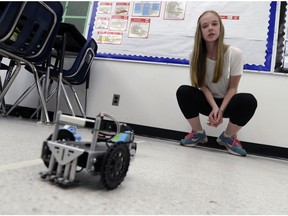 Kaley Grant, a robotics student at St. Marguerite Bourgeoys School, watches her robot perform a task on May 12, 2015.