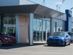 Part of the showroom is boarded up on the front of the Auto Gallery car dealership on the 600 block of Winnipeg Street. Police say in the early morning hours of Sept. 1 officers were sent to the dealership where someone had driven a red 2018 Subaru BRZ out of the showroom through the doors. Anyone with information about the car is being asked to call the Regina Police Service.