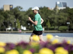 Regina's Renae Grubb, shown running at the Wascana Centre,  is looking forward to running in her 19th consecutive Queen City Marathon on Sunday. Approximately 6,000 runners are expected to take part in the QCM.