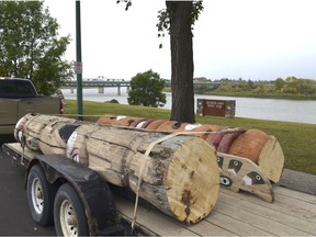 A totem pole created by Saskatchewan Penitentiary inmates in 1975 was disassembled and loaded on the back of a trailer to be transported from Prince Albert, Sask. to Okanese First Nation, where it will be restored and repainted, on Sept. 9, 2019. (photo by Peter Lozinski, Prince Albert Daily Herald)
