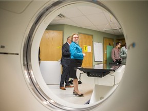 Karen Allen, a cancer survivor, is seen though a Computed Tomography (CT) simulator following a media event at the Saskatoon Cancer Centre in Saskatoon, Sask. on Wednesday, September 11, 2019. The Cancer Foundation of Saskatchewan is looking to raise $3 million to replace two existing CT Simulators.