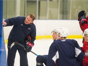 Head coach Dave Struch, left, is hoping to guide the Regina Pats back to the WHL playoffs.