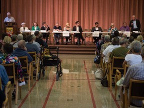 A crowd listens in as federal political candidates speak regarding their parties' positions toward seniors at the Wesley United Church on Hillsdale Street.