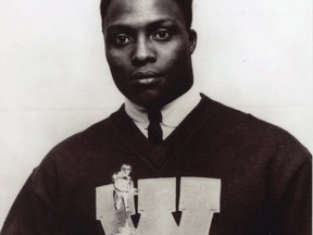 George Reed is shown in 1962, accepting the J. Fred Bohler Award as the Washington State Cougars’ most inspirational player.