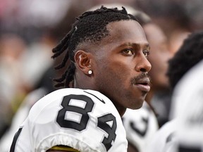 Former Oakland Raiders wide receiver Antonio Brown looks on during the first half against the Arizona Cardinals during a preseason game at State Farm Stadium.