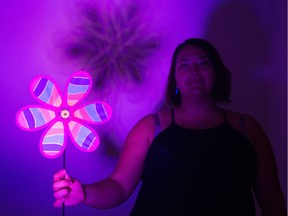 Jori Cachene stands with a shadow prop in her Regina home. She, along with Bruno Hernani and Roberto Lopez Lopez (neither of whom are pictured) are presenting Unheard Voices of the Land at Nuit Blanche on Sept. 29, 2019, in downtown Regina.