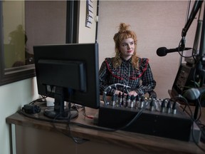 CJTR program director Amber Goodwyn sits in one of the station's radio studios in its 8th Avenue office.