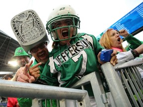 Saskatchewan Roughriders fans celebrate after a 2018 Banjo Bowl win over the host Winnipeg Blue Bombers.