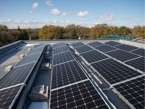 The roof of a building on Rae Street, upon which a solar array has been installed to provide the building with electricity.