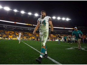 Ryan Fitzpatrick #14 of the Miami Dolphins walks off the field after losing to the Pittsburgh Steelers on October 28, 2019 at Heinz Field in Pittsburgh, Pennsylvania.