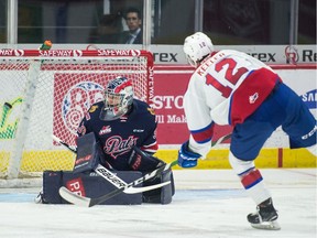 Liam Keller of the Edmonton Oil Kings scores a breakaway goal against Regina Pats netminder Max Paddock on Tuesday at the Brandt Centre. Edmonton won 5-3 to extend the Pats' losing streak to seven games.
