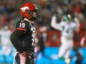 Stamps QB Bo Levi Mitchell winces and watches a replay after throwing an interception for a touchdown during CFL action between the Saskatchewan Roughriders and the Calgary Stampeders in Calgary on Friday, October 11, 2019. Jim Wells/Postmedia ORG XMIT: POS1910112129142100
