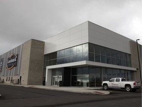 A truck from a disaster clean-up and restoration company sits outside the newly opened Landmark theatres in east Regina on Tuesday.