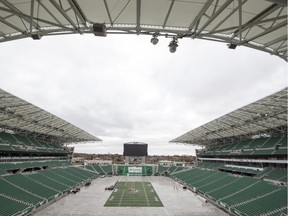 The transformation of Mosaic Stadium into a hockey venue began Tuesday, in preparation for the NHL's Heritage Classic. The Winnipeg Jets and Calgary Flames are to play at Mosaic Stadium on Oct. 26, with the WHL's Prairie Classic — between the Regina Pats and Calgary Hitmen — to follow on Oct. 27.
