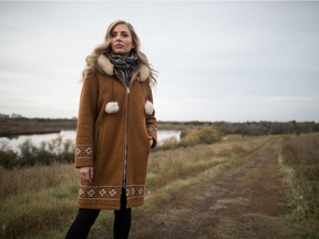 Ashley Bernstein stands on Douglas Park Hill in Regina. Bernstein is a youth care worker and Saskatchewan Roughriders cheerleader who speaks about the challenges she's had with mental health.