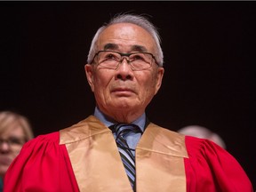 Arthur Wakabayashi sits on stage and waits to receive an honorary degree  during the University of Regina convocation ceremony, held at the Conexus Arts Centre.