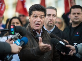 Jerry Dias, national president of Unifor, speaks to media outside the SaskPower building on Victoria Avenue regarding the union's bargaining with a number of Saskatchewan Crown corporations.