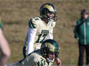 University of Regina Rams quarterback Josh Donnelly, 17, calls signals against the University of Alberta Golden Bears on Saturday in Edmonton. Donnelly threw three touchdown passes to lead the Rams to a 31-17 victory.