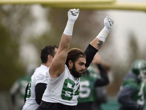 Saskatchewan Roughriders offensive lineman Dakoda Shepley celebrates an early end to Thursday's practice at the University of Regina. The practice ended early so the team could head to the airport to fly to Edmonton for Saturday's game.