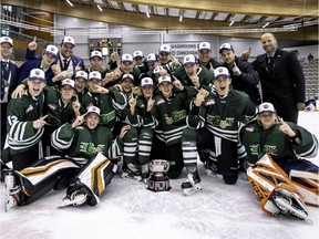 Team Saskatchewan celebrates a 4-2 victory over Manitoba in the final of the WHL Cup on Sunday.
