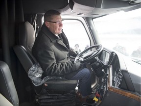 Premier Scott Moe prepares to drive a tractor trailer unit around the Regina Bypass a day before it being officially opened to the public. TROY FLEECE / Regina Leader-Post