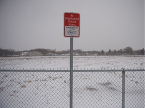 A sign warning motorists not to enter without authorization stands on the edge of what was once Taylor Field.