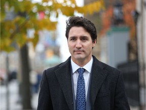 Prime Minister Justin Trudeau arrives for a news conference on October 23, 2019 in Ottawa. The politically weakened Trudeau set out to secure the support of smaller parties he will need to form a government after winning Canada's nail-biter federal election but falling short of a majority.