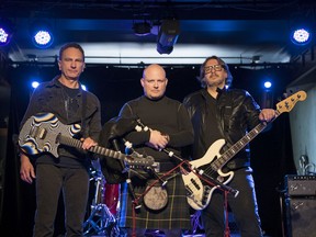 James Picton, from left, Johnny McCuaig and Kevin Kyle, three members of Arcana Kings (formerly known as the Johnny McCuaig Band), pose for a photo at Revival Music Room.