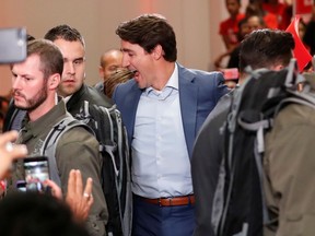 Liberal leader Justin Trudeau, wearing a bulletproof vest and surrounded by a heavily armed RCMP security detail, attends a rally during an election campaign visit to Mississauga, Ont., on October 12, 2019.