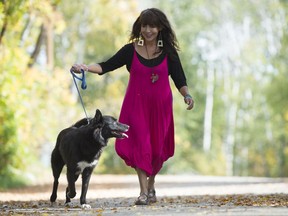 Carol Rose GoldenEagle walks her dog Saffy at Regina Beach. GoldenEagle's new novel Bone Black is about a woman who takes justice into her own hands when her sister becomes one of the many Missing and Murdered Indigenous Women.