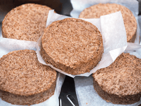 Uncooked Beyond Meat plant-based burger patties sit in the kitchen at a TGI Friday's restaurant.