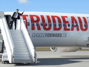 Liberal leader Justin Trudeau boards one of his campaign planes in Ottawa on Sept. 29, 2019.