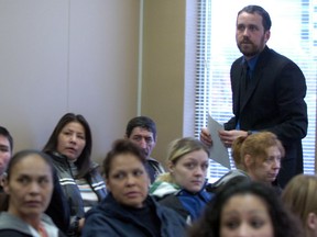 Shawn Fraser (standing), then executive director of Carmichael Outreach, acted as an advocate for the tenants who were evicted from 2060 Halifax Street in December, 2009. They are shown at a hearing in accordance with the Residential Tenancies act on January 20, 2010.