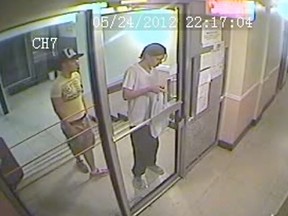 Security camera footage of Luka Magnotta, right, and Lin Jun entering Magnotta's apartment building May 24, 2012 in the time leading up to  the murder and dismemberment of Lin Jun. (Montreal police)