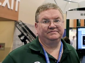 James A. Rowan (left) is shown with actor Ed Begley Jr. in a video promoting Enviro-Energies' vertical axis wind turbine.