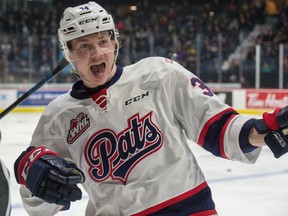 REGINA, SASK : January 1, 2019  -- The Regina Pats' Riley Krane (34) celebrates after scoring a goal during a game against the Prince Albert Raiders' at the Brandt Centre. BRANDON HARDER/ Regina Leader-Post