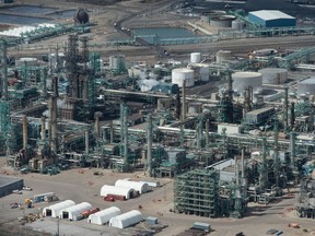 An aerial photo shows the Co-Op Refinery Complex.