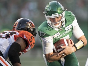 Quarterback Cody Fajardo, right, is one of many players who earned high marks in the Saskatchewan Roughriders' regular-season-ending report card.